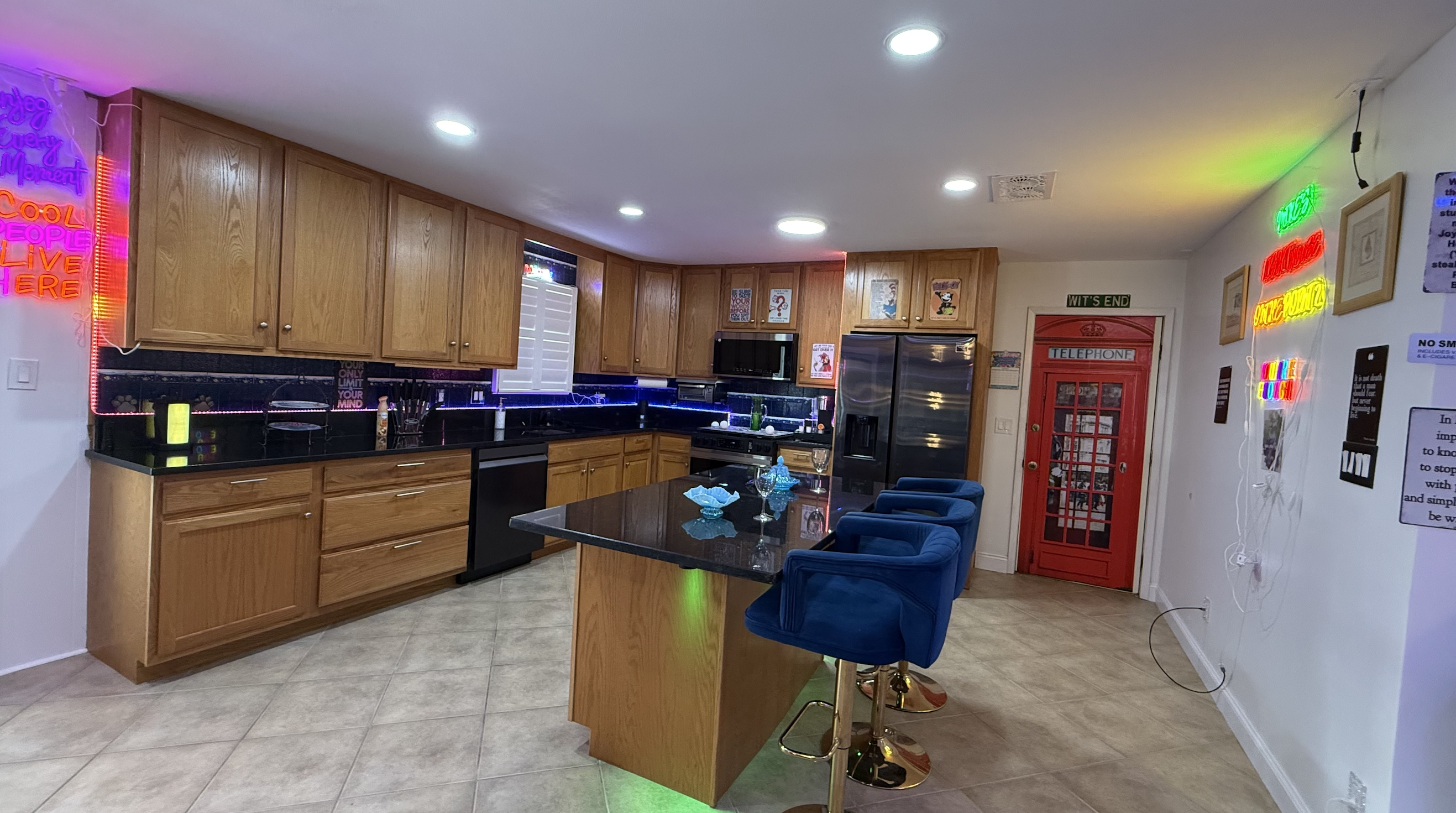 Kitchen and breakfast bar with LED under-cabinet lighting